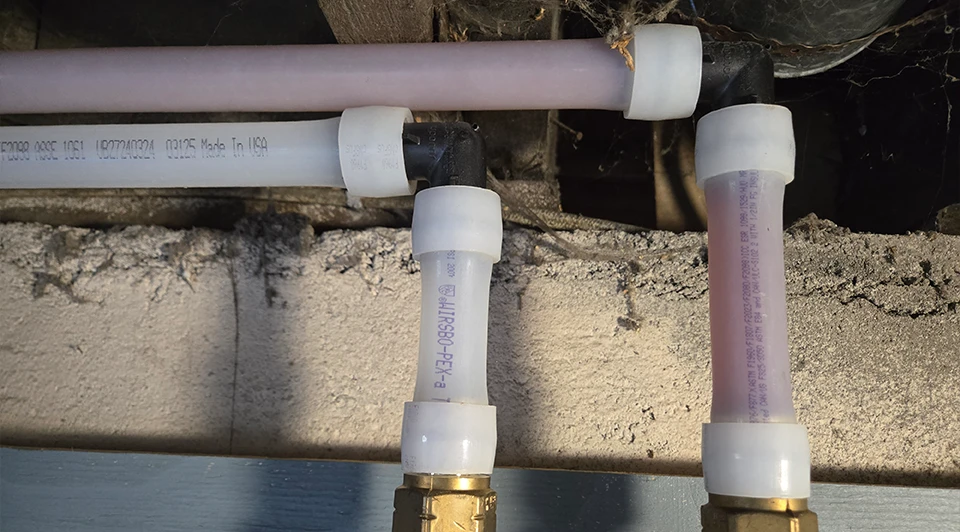 Before water treatment: visible sediment and rust staining in untreated Southern Ontario well water system